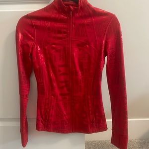 Never worn size 4 Lululemon red define jacket.